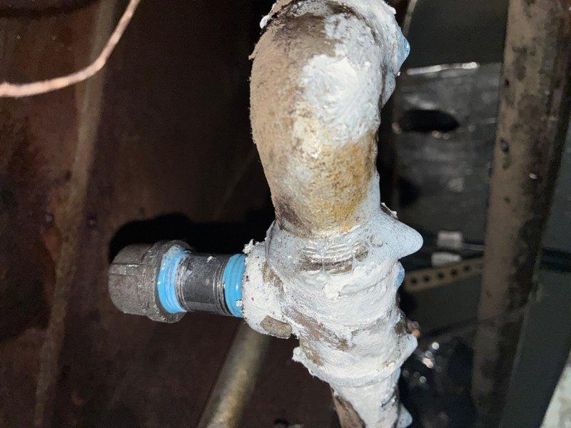 Capped three abandoned 1/2" gas lines in the basement—two lines running above ductwork and one line extending to a decommissioned gas lantern in the backyard. Performed gas pressure testing on both gas line systems to verify integrity and check for leaks as required by the city or gas company for service restoration. No permit was required as no new gas lines were added to the existing system.