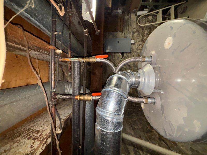Installed a new thermal expansion tank on the water heater system to protect against excessive pressure buildup caused by thermal expansion. The expansion tank was properly mounted and connected to the cold water supply line using appropriate brass fittings and flexible connectors. Additionally, installed a new pressure reducing valve (PRV) on the main water supply line entering the structure to regulate incoming water pressure and protect the plumbing system and fixtures from damage due to excessive municipal water pressure. Both installations were completed with proper support, secure connections, and tested for proper operation and leak-free performance.
