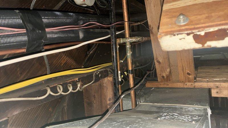 Completed full gas line replacement for a two-unit building due to multiple leaks in the existing piping system. Removed and replaced all gas lines serving furnaces and water heaters with new black iron pipe using MegaPress fittings. Existing gas lines to stoves were retained temporarily with new shut-off valves installed in the basement to allow for future isolation if needed. Rerouted gas piping as necessary to accommodate proper connections to all appliances. Pressure tested all new gas lines to verify system integrity and confirm no leaks present upon completion.