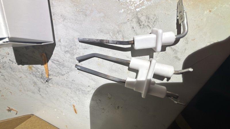 Replaced faulty sparker and flame rod assembly on tankless water heater unit to restore proper ignition function. Installed new flame rod gasket to ensure proper seal and sensor operation. Unit tested successfully following component replacement, confirming reliable ignition sequence and flame detection.
