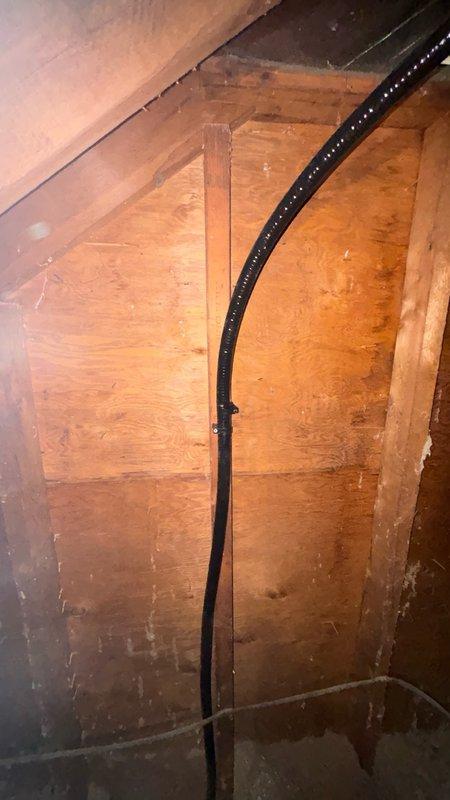 Installed new gas line from main line in attic to kitchen stove location for kitchen remodel. Ran flash shield piping with shut-off valves at main line connection and behind stove, installed stud guards in walls to protect gas line during routing, and capped line at stove location. Performed pressure testing to verify system integrity and confirm no leaks present upon completion.