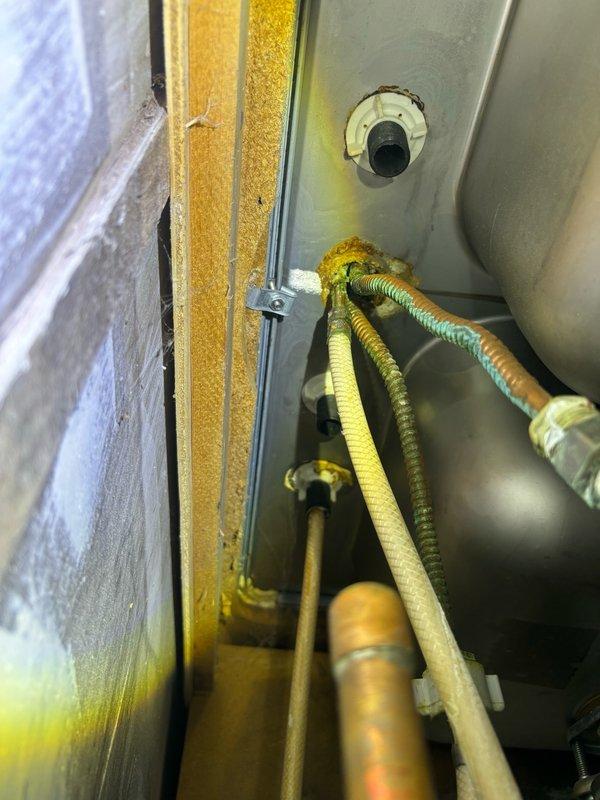 Responded to leaking kitchen faucet in 1970s-era home. Upon inspection, identified worn cartridge and deteriorated O-rings as source of leak. Replaced faulty cartridge assembly, installed new seals, and tested operation to confirm proper function and elimination of water drip. System restored to normal operation with no further leakage detected.