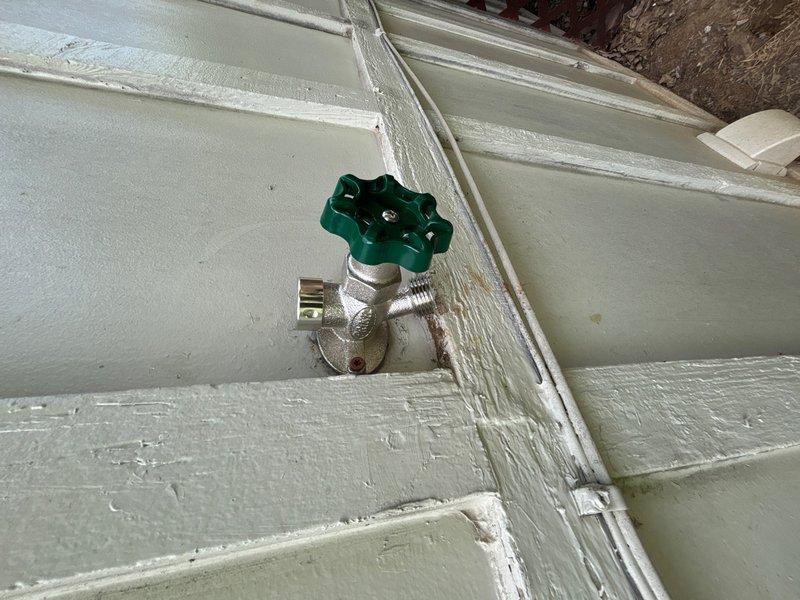 Replaced frost-free outside hose bib on exterior wall. Removed old valve assembly and installed new frost-free hose bib with shutoff valve featuring wheel-style handle. Ensured proper mounting to siding, verified secure connections, and tested system for proper operation and freeze protection functionality.