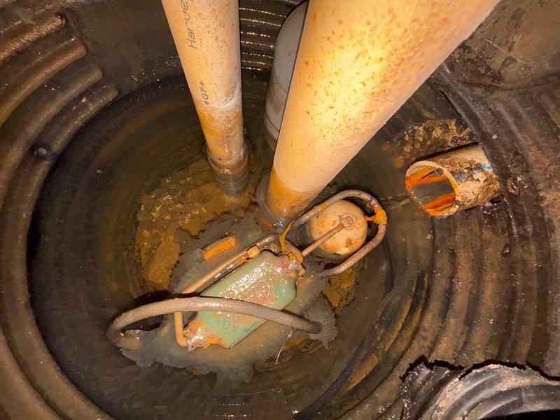 Replaced failed sump pump with new 1/3 HP unit in basement sump basin. The existing pump showed severe rust and corrosion throughout the housing and metal components, rendering it ineffective for proper water removal. Installed the new pump with proper discharge piping connections to ensure reliable operation and basement flood protection.