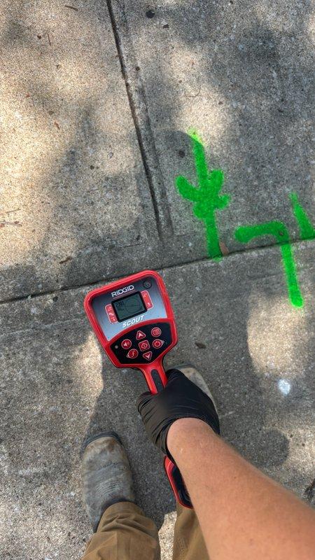 Performed video camera inspection of main sewer line from building to street connection beneath driveway. Utilized RIDGID inspection equipment to assess pipe condition, integrity, and identify any potential issues such as cracks, blockages, root intrusion, or deterioration. Line was found to be in good operational condition with no immediate concerns noted.