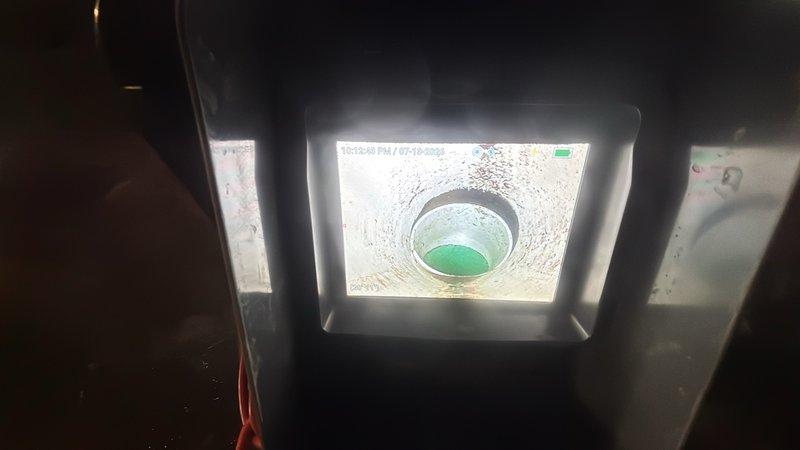 Performed hydro-jetting service on clogged drain line to restore proper flow and drainage. High-pressure water jetting equipment was used to clear blockages and buildup from the interior pipe walls. The drain line was successfully cleared, with floor drain and roof vent stack verified to be functioning properly after service completion.