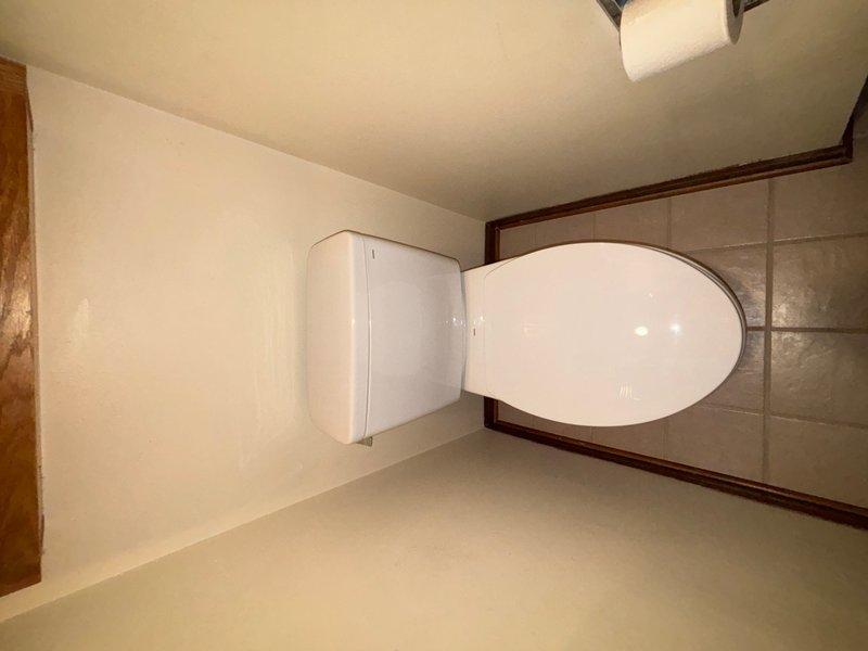 Completed installation of three customer-supplied toilets in residential bathroom. Each unit was properly set using new wax ring seals to ensure watertight connections between the toilet base and existing floor flanges. All fixtures were secured to the floor, water supply lines connected, and units tested for proper flush operation and leak-free performance.