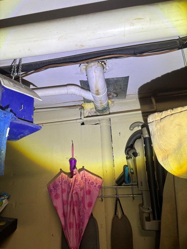 Responded to a clogged bathroom sink complaint and successfully cleared the drainage obstruction. Inspected the P-trap assembly and drain line beneath the vanity, verified proper water flow restoration, and confirmed the plumbing system was functioning correctly with no leaks present.