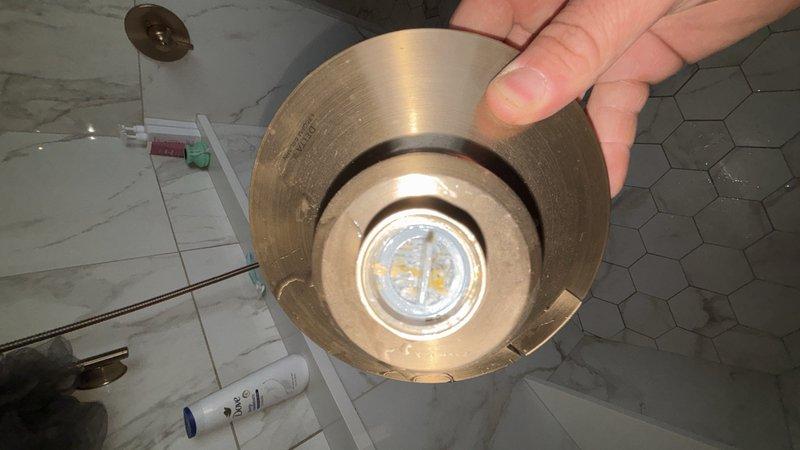 Responded to whole-house low water pressure complaint at a three-year-old residential property. Upon arrival, confirmed best contact number and located main water shutoff valve in basement. Conducted systematic pressure testing and inspection throughout the home to identify the source of reduced water flow. Examined plumbing fixtures in multiple rooms, including bathroom facilities. Inspected aerators and fixture components for debris or mineral buildup that could restrict flow. Documented conditions with photographs showing bathroom fixtures and sink drain areas. Verified proper operation of main shutoff valve and checked for any partial closure or valve malfunction that could cause pressure reduction throughout the dwelling. Completed diagnostic assessment during scheduled four-hour service window.