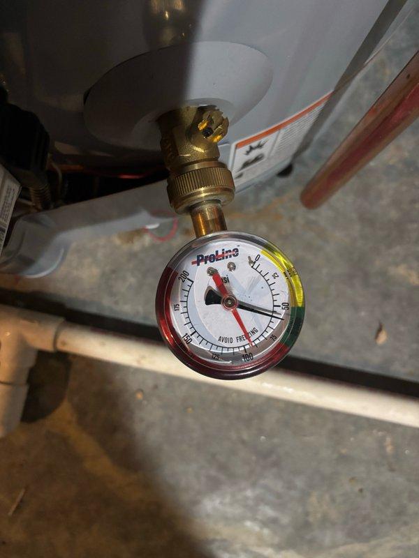 Performed comprehensive plumbing maintenance inspection of water heater system and associated components. Verified proper operation of pressure relief valve, checked pressure gauge readings to ensure system was operating within safe parameters, and inspected all visible piping connections including copper supply lines and brass fittings for leaks or corrosion. Examined condition of water heater tank, mounting hardware, and surrounding plumbing infrastructure in utility area to ensure thorough assessment per customer request.
