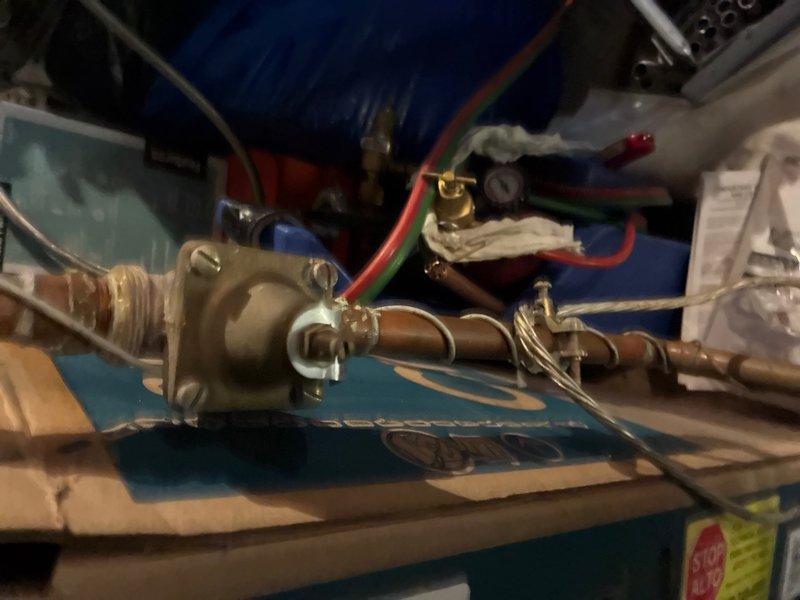 Performed comprehensive whole home plumbing inspection at customer's request with no reported issues. Conducted thorough visual assessment of accessible plumbing fixtures, supply lines, drain systems, and water heating equipment throughout the residence. 

Inspected kitchen sink assembly, confirming proper drainage function and evaluating condition of double-basin fixture with center divider configuration. Observed minor mineral deposits and water staining on basin surfaces, consistent with normal use and hard water conditions. Verified drain covers and strainers were properly seated and functional.

Examined water heater installation and associated plumbing connections in utility area. Inspected brass valve assemblies, shut-off valves, and supply line connections for proper installation and potential leaks. Evaluated condition of flexible supply hoses, confirming secure attachment points and absence of visible deterioration. Verified temperature and pressure relief valve accessibility
