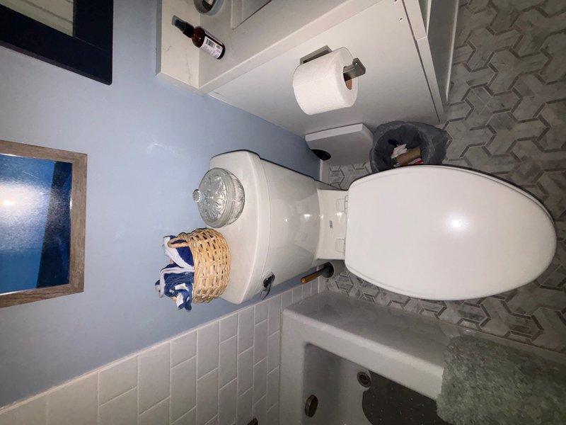 Completed comprehensive whole-home plumbing inspection at customer's request with no specific issues reported. Performed thorough evaluation of all accessible plumbing fixtures, water supply lines, drain systems, and visible components throughout the residence. Inspected bathroom facilities including toilet tank internals, fill valve, flush valve assembly, overflow tube, and supply connections—all components found to be functioning properly with noted presence of blue residual staining from previous use of in-tank cleaning tablets. Verified proper operation of pedestal sink, examined visible plumbing connections, and assessed overall fixture condition. All plumbing systems evaluated were operating within normal parameters with no immediate repairs required at time of inspection.