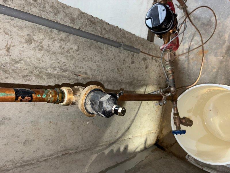 Installed a new 3/4" pressure reducing valve (PRV) on the main water supply line to regulate incoming water pressure and protect the plumbing system from excessive pressure damage. Additionally, installed a thermal expansion tank on the water heater system to accommodate thermal expansion of heated water and prevent pressure buildup that could damage fixtures and appliances. Both installations were completed with proper copper pipe connections and shutoff valves for future serviceability.