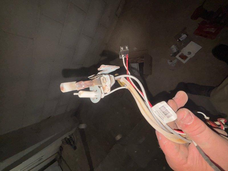 Replaced defective water heater burner assembly under warranty coverage. Disconnected electrical connections and gas supply line, removed failed burner component, and installed new OEM replacement burner. Reconnected all wiring harnesses, verified proper electrical continuity, and restored gas supply. Tested ignition sequence and confirmed proper flame operation and temperature control functionality. Unit restored to full operational status with all safety systems functioning as designed.