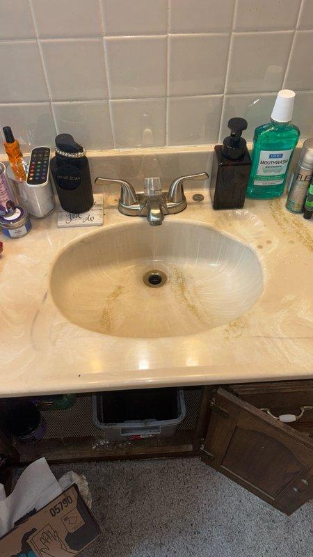 Responded to service call for non-draining kitchen and hall bathroom sinks. Upon arrival, performed diagnostic assessment of both fixtures. Executed professional drain cleaning procedures on the kitchen double-basin stainless steel sink and hall bathroom vanity sink to restore proper drainage. Cleared blockages from drain lines using appropriate drain cleaning equipment and techniques. Tested both fixtures post-service to verify full water flow and proper drainage function. All drains now operating within normal parameters.
