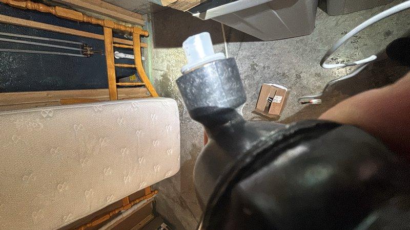 Replaced refill port assembly on Lindyspring water softener system. Installed part number CV3395, which includes integrated chlorine generator (black) and CV3395-G salt monitor (gray) as a single assembly unit. System tested and verified operational upon completion.