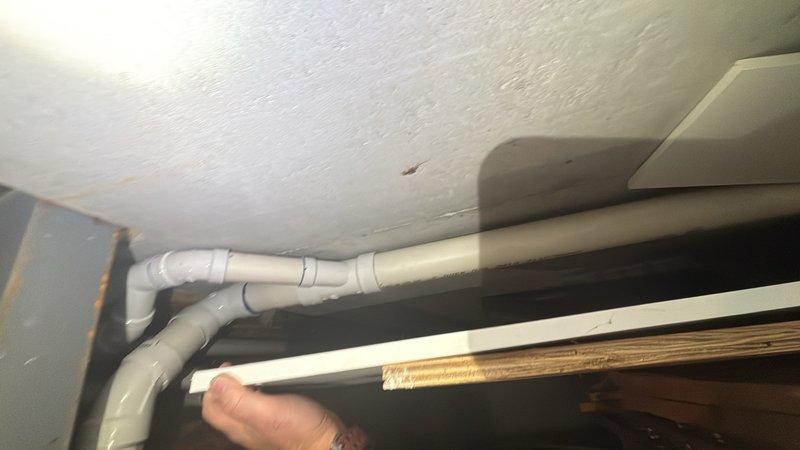 Completed comprehensive whole home plumbing inspection including basement utility areas and bathroom fixtures. Examined exposed supply lines, drainage piping, and structural support systems in basement crawlspace, verifying proper installation and identifying any potential issues. Tested shower functionality in bathroom, confirming proper water flow and pressure from handheld fixture and verifying drainage performance.