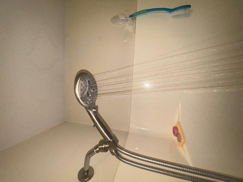 Completed comprehensive whole home plumbing inspection including basement utility areas and bathroom fixtures. Examined exposed supply lines, drainage piping, and structural support systems in basement crawlspace, verifying proper installation and identifying any potential issues. Tested shower functionality in bathroom, confirming proper water flow and pressure from handheld fixture and verifying drainage performance.