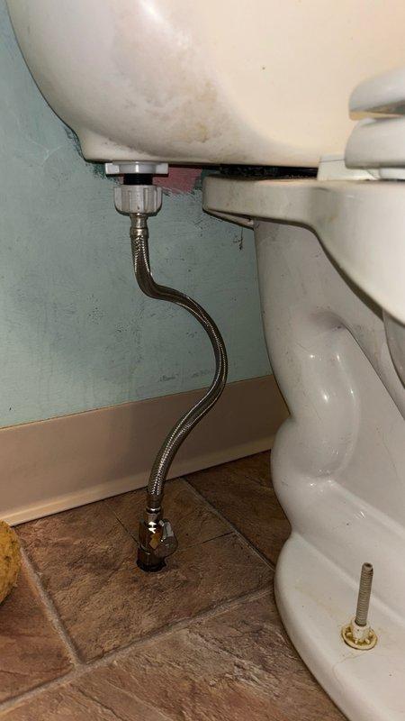 Responded to service call for malfunctioning toilet flush valve in master bathroom. Upon arrival, removed tank lid and inspected internal flushing mechanism components. Identified faulty flush valve assembly preventing proper toilet operation. Replaced defective flush valve with new unit, including blue float valve and associated hardware. Tested flushing system multiple times to ensure proper water flow, fill cycle, and shut-off function. Verified all connections were secure and tank was refilling to appropriate water level. Reinstalled tank lid and confirmed toilet was operating correctly with no leaks detected.