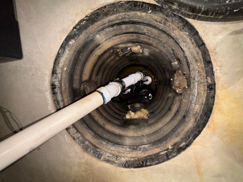 Responded to service call for sump pump system activating backup battery immediately upon operation. Upon arrival, inspected sump pump basin and primary pump unit in basement utility area. Found primary sump pump failing to engage properly, causing system to default to battery backup power instead of running on AC power. Tested pump operation and verified electrical connections to primary pump unit. Identified issue with pump float switch mechanism preventing proper activation of primary pump motor. Adjusted float switch assembly and cleared debris from basin that was interfering with float movement. Cycled system multiple times to confirm primary pump now activating correctly on AC power without triggering backup battery system. Verified discharge piping clear and operational. System restored to normal function with primary pump responding appropriately to water level changes.