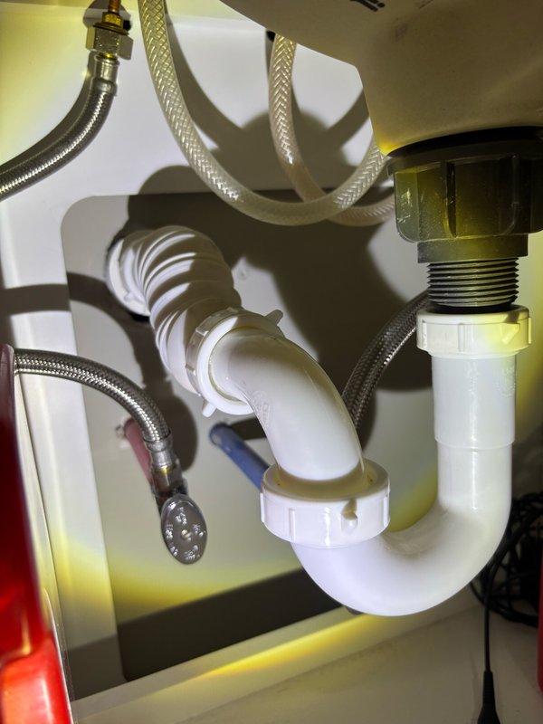 Replaced two flexible water supply hoses on dual sink fixtures. Both braided stainless steel supply lines were disconnected from existing connections, removed, and new flex hoses were installed with proper connections to shut-off valves and faucet tailpieces. All connections were tightened to manufacturer specifications and tested for leaks under full water pressure.