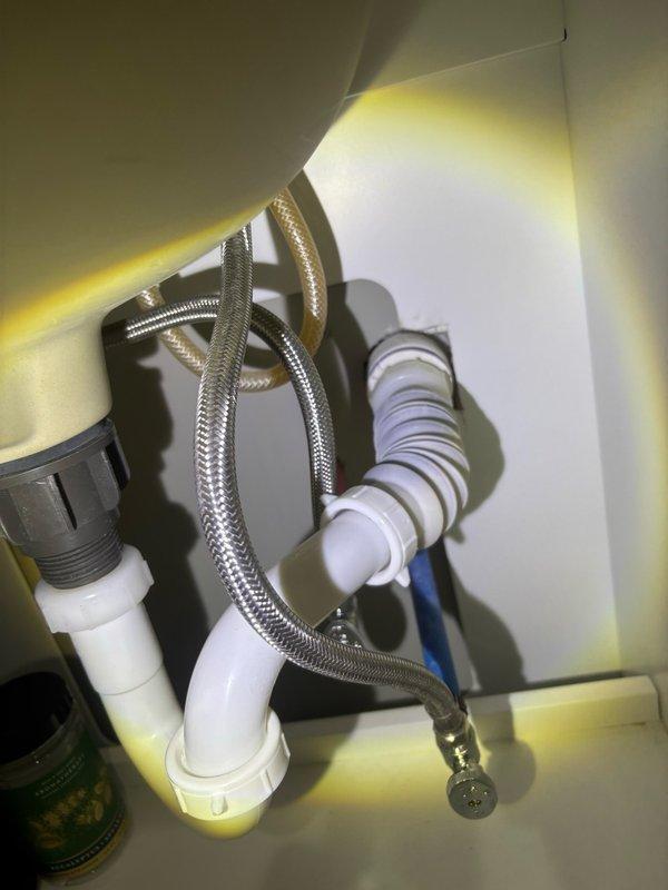 Replaced two flexible water supply hoses on dual sink fixtures. Both braided stainless steel supply lines were disconnected from existing connections, removed, and new flex hoses were installed with proper connections to shut-off valves and faucet tailpieces. All connections were tightened to manufacturer specifications and tested for leaks under full water pressure.