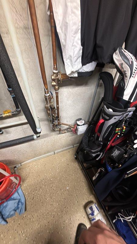 Completed preventive maintenance agreement renewal inspection on electric water heater system. Performed comprehensive evaluation of water supply valve assemblies, washing machine connections, and associated plumbing fixtures. Inspected chrome-plated shut-off valves with flexible supply lines, confirmed proper operation and absence of leaks. Documented existing conditions of utility area plumbing components and verified all connections were secure and functioning within normal parameters.