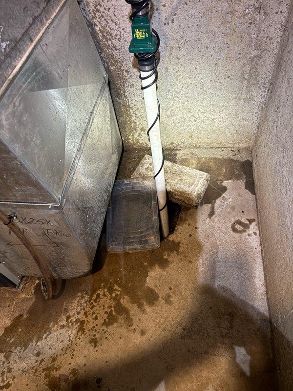 Successfully installed customer-supplied sump pump in basement utility area. Installation included proper positioning of pump basin, connection of discharge piping using PVC with appropriate fittings and flexible couplings, and routing of electrical supply with secure fastening. All connections were tested for proper operation and verified discharge flow through existing piping system.