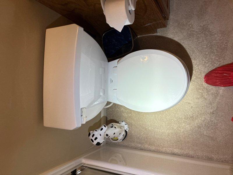 Responded to callback regarding plumbing maintenance concerns about toilets not being inspected during initial visit. Performed comprehensive inspection of bathroom plumbing fixtures including toilet water supply connections, shut-off valve, and supply line integrity. Verified proper operation of toilet fill valve, flapper mechanism, and flush system. Documented all plumbing components with photographic evidence showing toilet installation, water supply line connections, and fixture conditions to confirm complete maintenance protocol was followed.