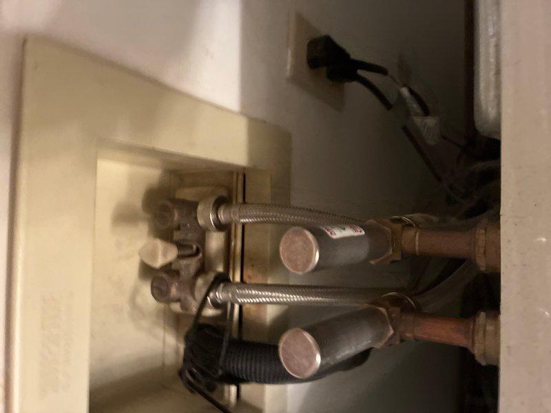 Completed scheduled plumbing maintenance inspection and verification of fixtures. Inspected under-sink shut-off valves with braided supply lines and pressure relief valve assembly with copper piping, confirming all connections are secure and functioning properly. All plumbing components show no signs of leaks or deterioration, and system is operating within normal parameters.