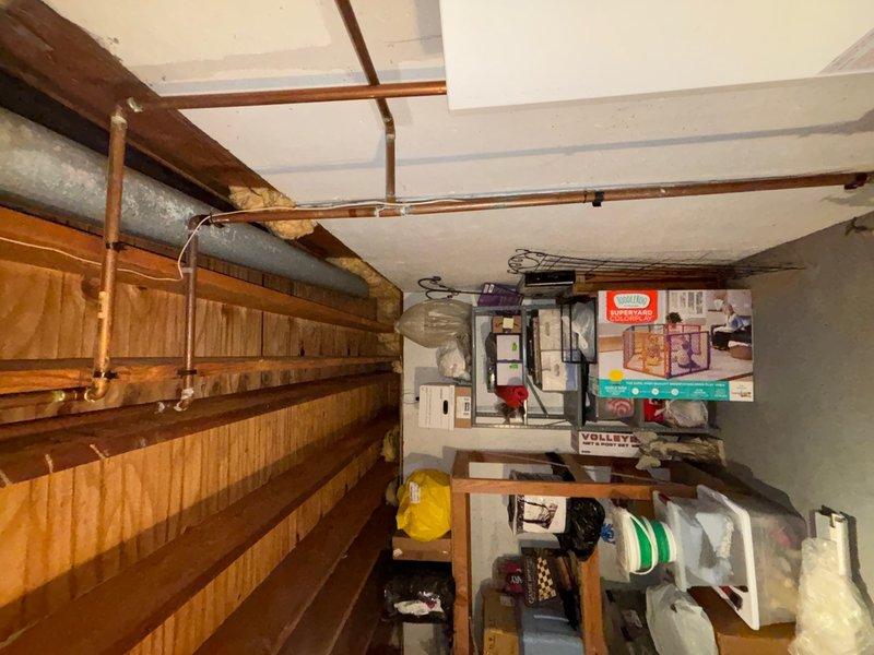 Conducted on-site evaluation of existing gas-fired tankless water heater located in basement. Unit is over 20 years old and currently operational. Inspected internal components, heat exchanger, venting system, and gas connections. Documented existing installation configuration including water supply lines, gas piping, condensate drainage, and electrical connections. Photographed unit condition and surrounding mechanical systems to provide comprehensive assessment for tankless water heater replacement estimate.