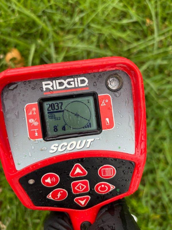 Performed camera inspection of sewer line to assess interior pipe condition and identify potential issues. Utilized RIDGID Scout locating equipment to trace line path and determine depth of pipe at key access points. Inspection revealed line routing from residence through front yard area, with camera successfully navigating the system to document pipe integrity and locate position of underground infrastructure.
