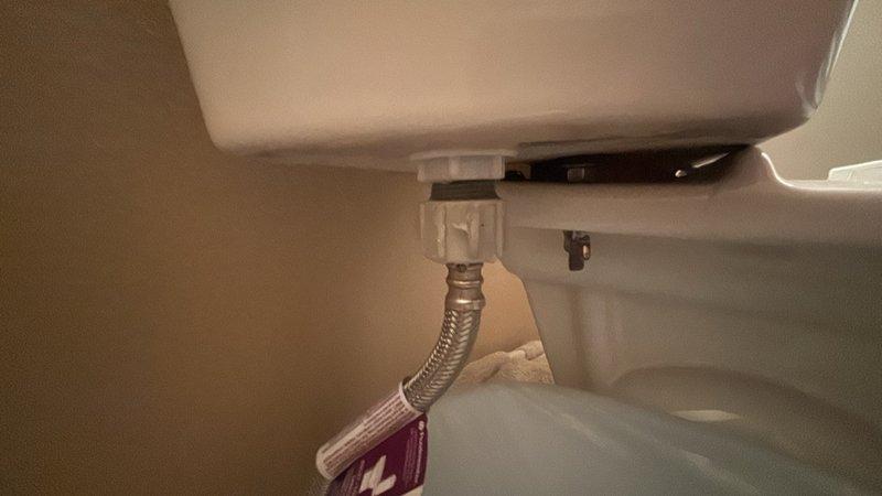 Responded to recurring leak issue in second floor guest bathroom toilet that was previously serviced in June. Inspected tank components and water supply connections, identifying worn flush valve assembly as the source of the intermittent leak. Replaced flush valve mechanism with new unit, tested fill cycle and shut-off operation, and verified all connections for proper seal and function with no active leaks detected upon completion.