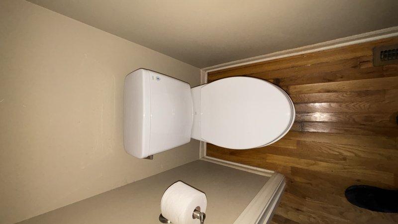Completed installation of new Toto Drake two-piece toilet in residential bathroom, including removal of existing fixture and installation of new wax ring seal to ensure proper connection to waste flange. Verified proper positioning, secure mounting, and tested for leaks and proper flush operation upon completion.