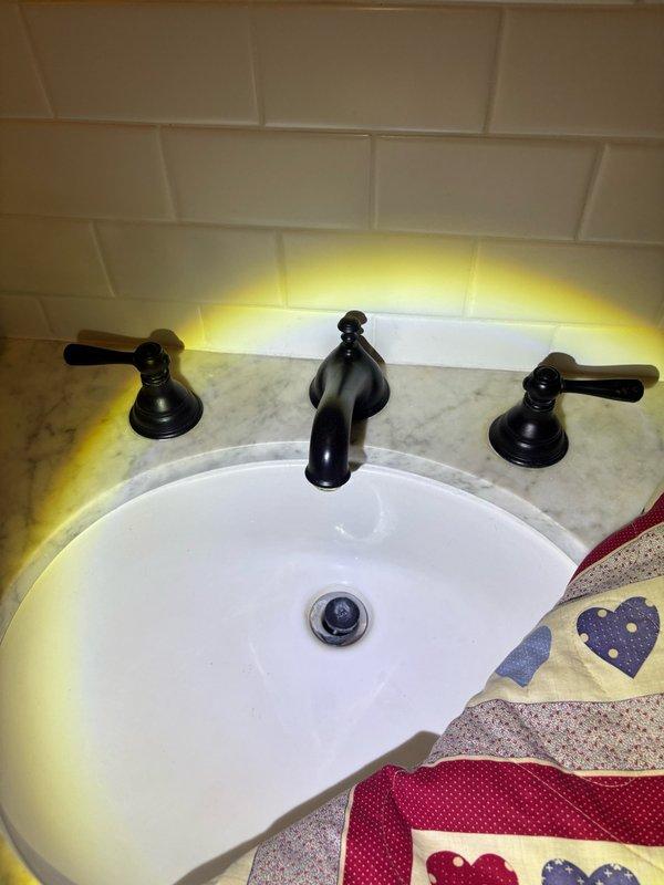 Responded to emergency call for burst pipe with water already shut off at main supply. Conducted thorough diagnosis of plumbing system and identified source of pipe failure. Completed necessary repairs to restore water service and verified all fixtures, including bathroom sink faucet, were functioning properly without leaks.