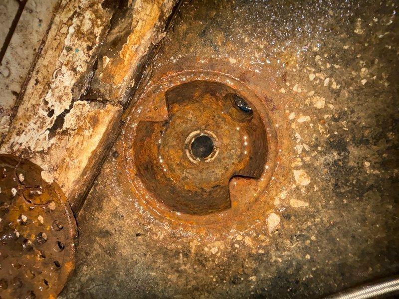 Responded to main drain stoppage in basement of 55-year-old home caused by tree root intrusion. Successfully cleared main drain line using professional drain cleaning equipment to restore proper flow and drainage. Additionally replaced deteriorated wax ring seal on toilet as requested to prevent future leaks and ensure proper fixture operation.