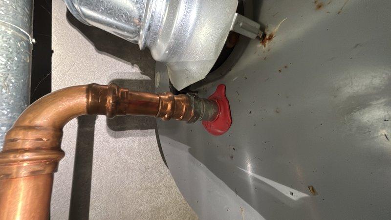 Responded to reported low water pressure throughout home occurring when toilets were flushed, along with slow drainage in master bathtub. Conducted comprehensive inspection of plumbing system including crawl space and attic areas to identify source of pressure loss. Located and examined main water supply lines, including copper piping with shut-off valves. Inspected visible plumbing infrastructure for obstructions, leaks, or valve restrictions that could impact water flow. Documented existing conditions of copper supply lines showing normal aging and patina. Assessed HVAC ductwork proximity to plumbing components to rule out any interference issues. Identified potential causes of pressure fluctuations and drainage concerns requiring further evaluation and repairs.