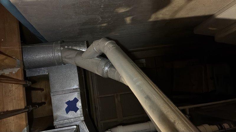 Responded to service call for clogged flue vent on gas-fired tanked water heater located in basement. Upon inspection, identified blockage in the flue vent system that was restricting proper exhaust ventilation from the water heater. Cleared obstruction from flue piping to restore adequate draft and ensure safe combustion gas venting. Verified proper flue operation and confirmed water heater was venting correctly upon completion.