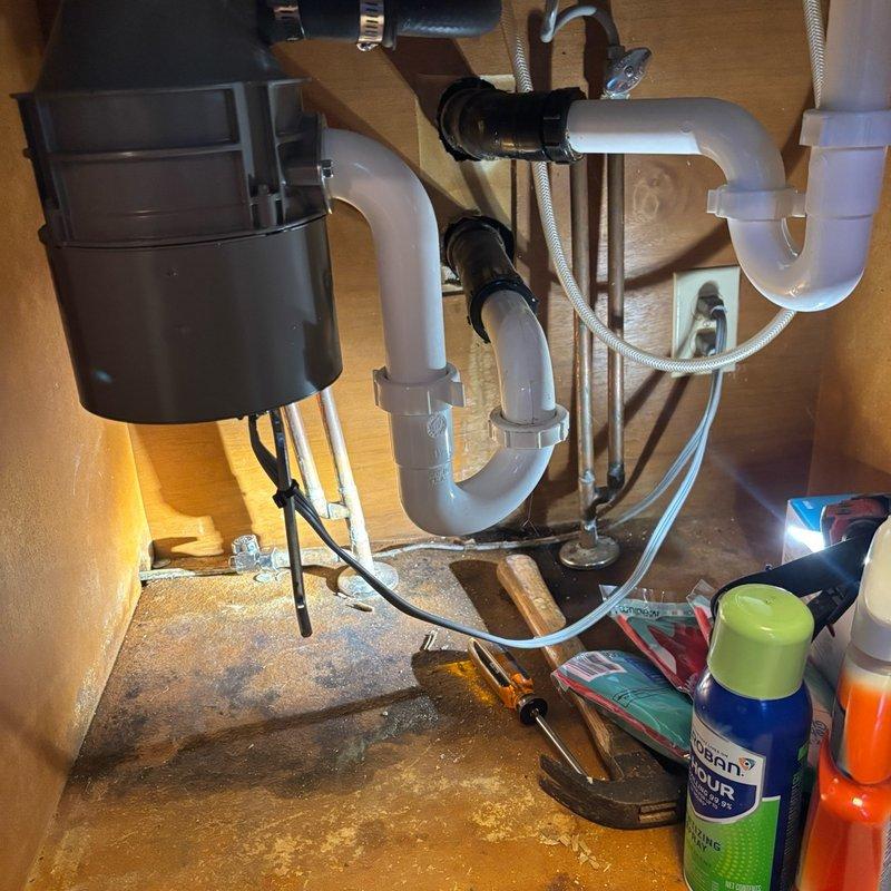 Replaced faulty water shut-off valve under kitchen sink to restore proper water pressure and installed new dishwasher connection. The existing valve showed signs of corrosion and age-related wear, which was causing restricted water flow to the kitchen fixtures. All plumbing connections were secured with proper fittings and tested for leaks upon completion.