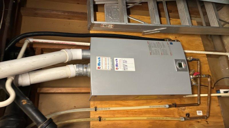 Completed preventative plumbing maintenance inspection on HVAC system equipment located in basement area. Inspected and documented ProLine pressure gauge readings and verified proper operation of system components, including PVC drain lines, copper refrigerant lines, and associated plumbing connections to ensure optimal system performance.
