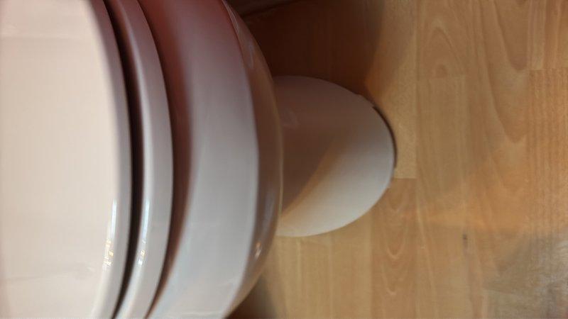 Responded to a leaky toilet complaint and performed diagnostic inspection of the fixture and water supply connections. Upon examination, identified compromised seal integrity requiring replacement of internal components. Replaced faulty flapper valve and tank-to-bowl gasket, then reconnected and tested the braided stainless steel supply line for proper water flow and pressure. Verified all mounting hardware and base seal remained secure with no additional leaks present. Cycled the flush mechanism multiple times to confirm proper operation and conducted final leak inspection of all connection points. Unit returned to full operational status with no water seepage detected.