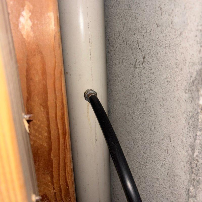 Performed comprehensive tune-up and maintenance service on a 10-year-old Concord water softener system located in basement. Inspected control head functionality, verified proper regeneration cycles, and tested all system components including the black brine tank and stainless steel mineral tank. Examined plumbing connections including copper supply lines showing mineral deposits and white PEX distribution piping with brass fittings. Cleaned control valves, checked salt levels in brine tank, and confirmed proper water flow through the treatment system. All components found to be operating within normal parameters, and system returned to full service.