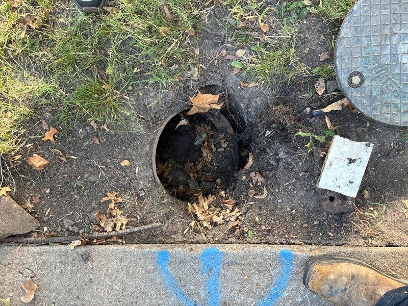 Conducted plumbing estimate for water well replacement located below the water meter. Inspected underground utility access points and existing water service infrastructure, documenting current conditions of below-grade plumbing components and access covers for planned replacement work.