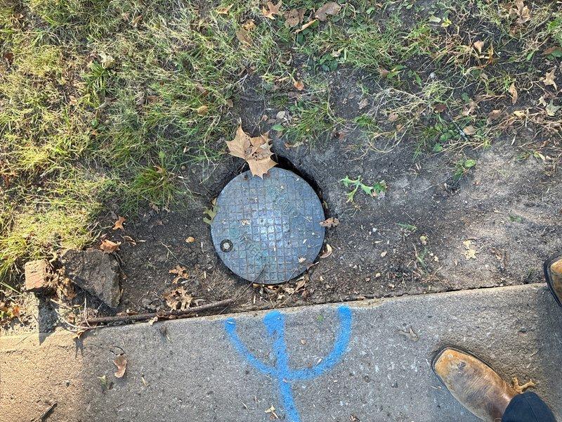 Conducted plumbing estimate for water well replacement located below the water meter. Inspected underground utility access points and existing water service infrastructure, documenting current conditions of below-grade plumbing components and access covers for planned replacement work.