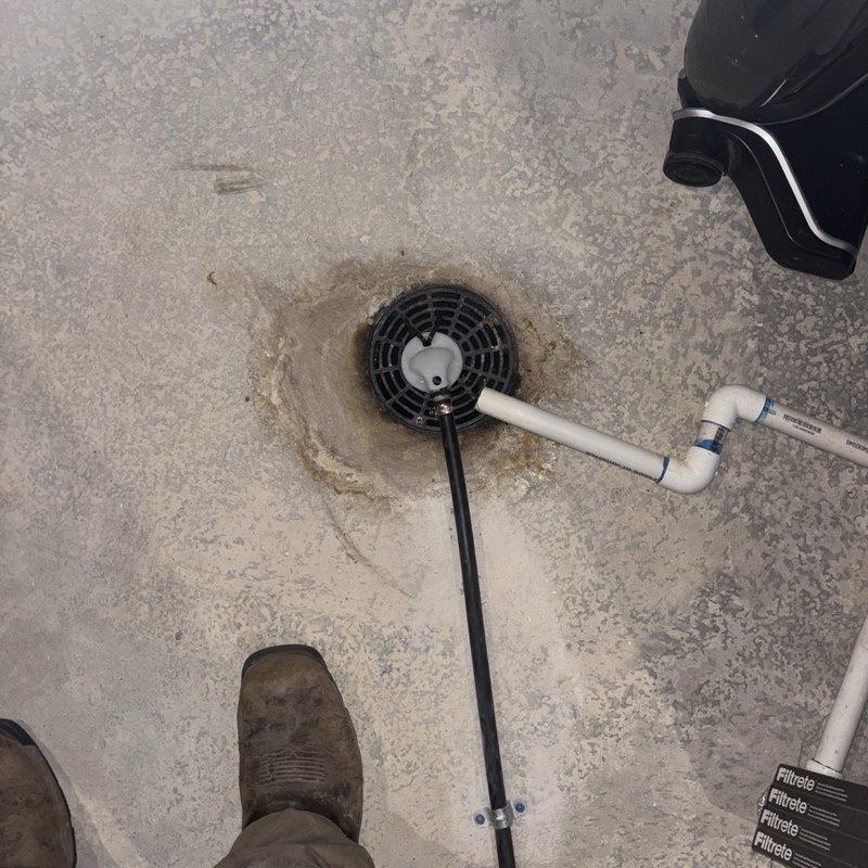Responded to service call for non-functioning water softener installed in basement several months prior. Upon arrival, confirmed unit was not consuming salt and water exhibited no softening characteristics. Performed diagnostic inspection of water softener system, checking bypass valve position, control valve settings, and regeneration cycle programming. Examined inlet and outlet plumbing connections, verified proper water flow direction through the system, and inspected brine tank assembly for proper salt bridge or mushing conditions. Tested system controls and verified electrical connections to ensure proper power supply to control head. Identified installation or configuration issue preventing regeneration cycles from initiating. Made necessary adjustments to restore proper system operation and verified water softening function was restored.