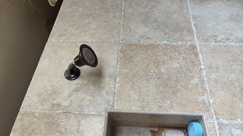 Responded to service call for tankless water heater not producing hot water through two shower heads in bathrooms. Upon arrival, diagnosed and repaired the tankless water heater system to restore proper hot water delivery to the affected fixtures. System tested and confirmed operational with adequate hot water temperature output at all points of use.