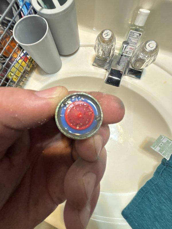 Responded to service call for low water pressure throughout residence. Upon inspection, identified clogged faucet aerators as primary cause of reduced water flow. Removed and cleaned aerator screens from affected fixtures, removing mineral deposits and sediment buildup. Inspected internal components including washers and flow restrictors for wear and damage. Reinstalled aerators and tested water pressure at multiple fixtures to confirm restoration of normal flow rates throughout the home.