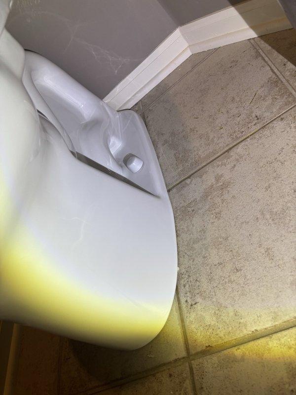 Removed existing toilet from bathroom and properly disposed of old unit. Installed customer-supplied toilet fixture with new wax ring to ensure proper seal between toilet base and floor flange. Installed new water supply line connecting shut-off valve to toilet tank fill valve, replacing previous line. Verified proper mounting, tested for leaks, and confirmed flush operation functioning correctly upon completion.