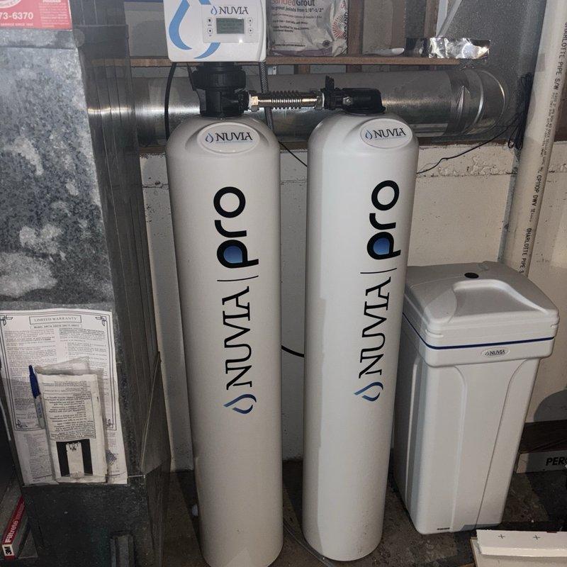 Responded to service call for non-operational gas water heater in basement. Upon arrival, performed diagnostic assessment of existing gas-fired tanked water heater system. Inspected gas supply line connections, pilot assembly, thermocouple, and main burner operation. Evaluated associated plumbing connections including cold water inlet with shutoff valve, hot water outlet, temperature and pressure relief valve, and gas control valve. Checked for proper venting and combustion air supply. Assessed water treatment system components including dual water softener tanks and brine reservoir to ensure no interference with water heater operation. Verified proper function of expansion tank and pressure regulation equipment in the plumbing assembly. Completed necessary repairs to restore hot water service. System tested and confirmed operational before departure.