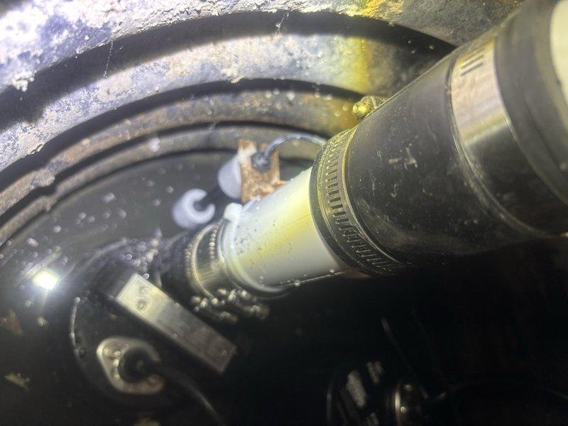 Installed Watchdog sump pump system in basement location with existing basin showing signs of water damage and mineral deposits. Primary installation included 1/2 HP energy efficient permanent split capacitor (PSC) pump with capacity of 4,400 GPH at 0 ft. lift and 3,540 GPH at 10 ft. lift, along with battery backup system providing 2,500 GPH at 0 ft. lift and 1,850 GPH at 10 ft. lift. Configured float mechanism, connected electrical components including backup battery unit, and verified proper operation of dual pump system to provide reliable water removal and emergency backup protection.